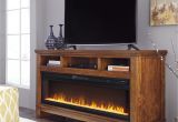 Sharlowe Entertainment Center with Wide Fireplace Insert Signature Design by ashley Ralene 65 In Tv Stand with Optional
