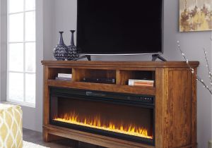 Sharlowe Entertainment Center with Wide Fireplace Insert Signature Design by ashley Ralene 65 In Tv Stand with Optional