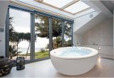 Small Bathtubs Australia Make A Splash Into Your Bathroom with Floor to Ceiling Windows