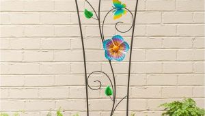 Spinning Garden Art Our Spinning Flower Garden Trellis Does Double Duty as Plant Support