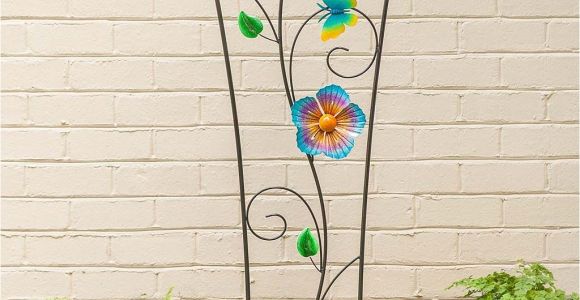 Spinning Garden Art Our Spinning Flower Garden Trellis Does Double Duty as Plant Support