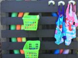 Standing Pool Float Rack Diy Pool toys Storage Painted Pallet Dollar Store Baskets and Hooks