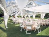 Tent Table and Chair Rental Near Me 30×60 Clear top Tent with Wheel Style Cafe Lights and Swag Draping