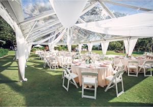 Tent Table and Chair Rentals Near Me 30×60 Clear top Tent with Wheel Style Cafe Lights and Swag Draping