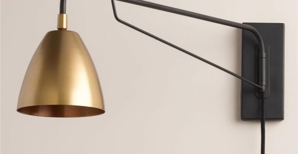 Track Lighting with Plug In Cord Crafted with A Pivoting Arm and Adjustable Antique Brass Shade