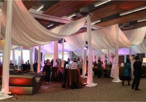 Up Lighting for Weddings A Wedding Show with Giant White Canopies and Colored Up Lighting