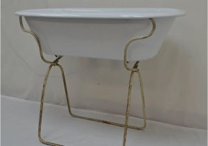 Vintage Baby Bathtub with Stand Vintage Porcelain Enamel Baby Bath On Folding Stand at 1stdibs
